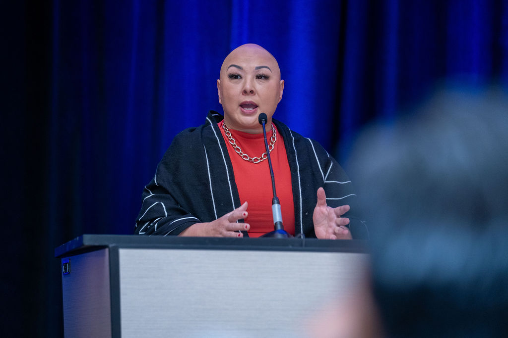 Vivian Yip speaking on stage