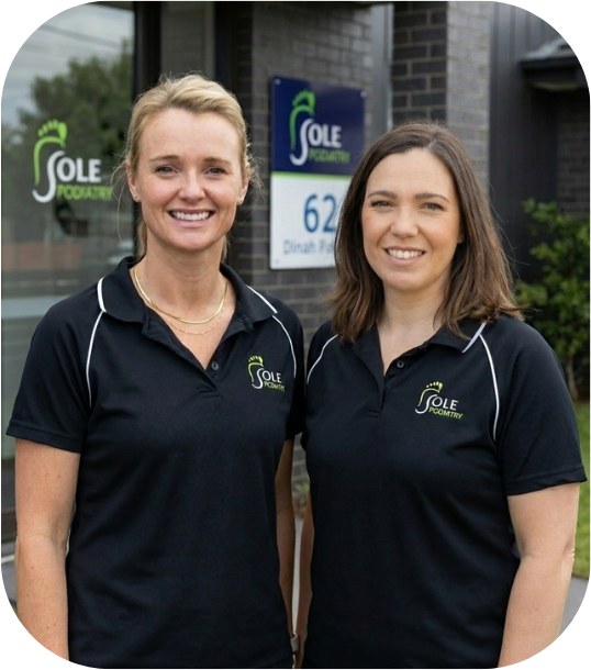 Two Sole Podiatry team members outside a clinic
