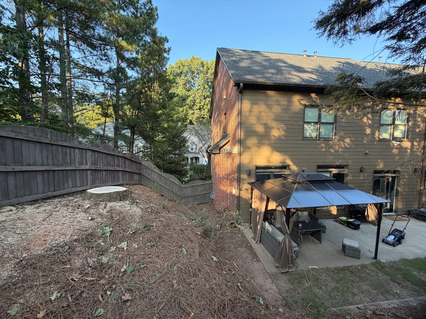 Tree removal beside a home