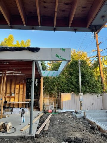 Installed metal fascia panels along a roof edge