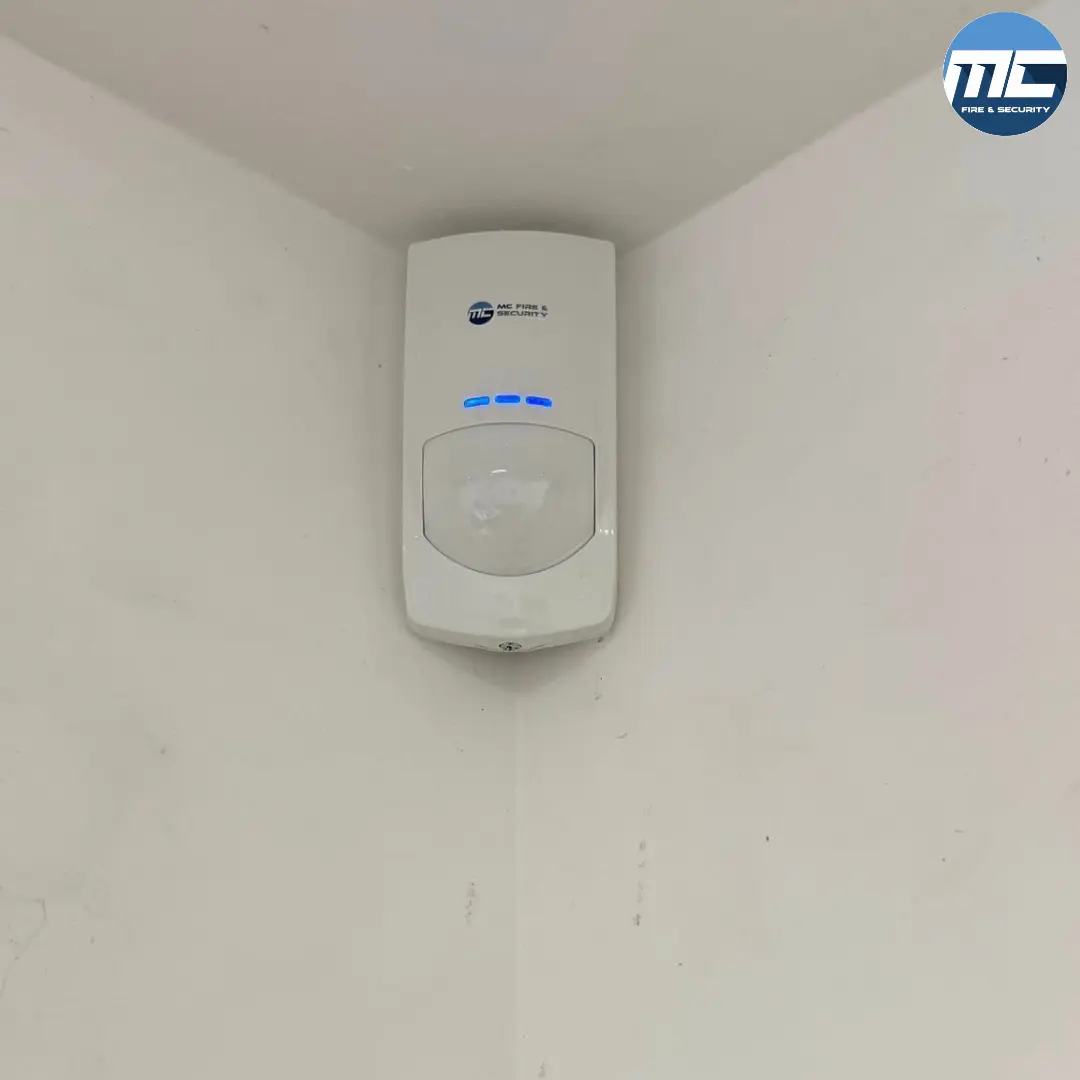 MC Fire & Security branded PIR motion detector — children's nursery