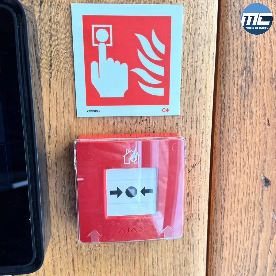 Manual call point on timber-clad wall — Marazion fire alarm install