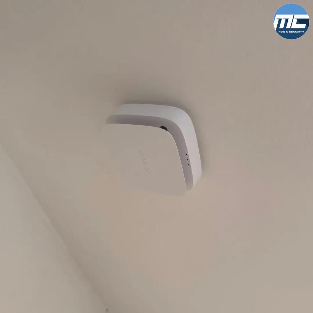 Ceiling-mounted fire detector — MC Fire & Security install