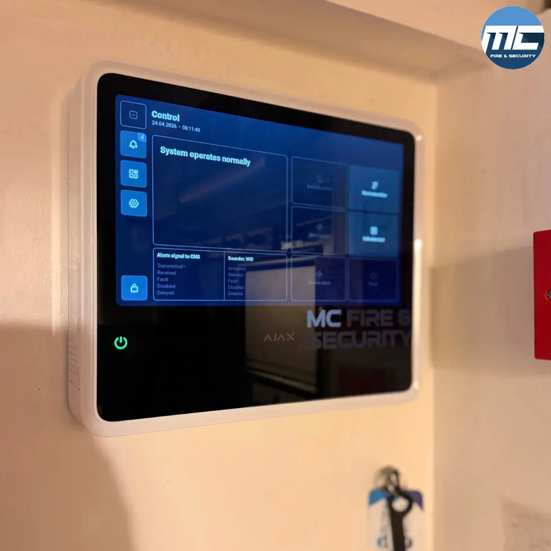 Ajax intruder alarm keypad showing 'system operates normally'