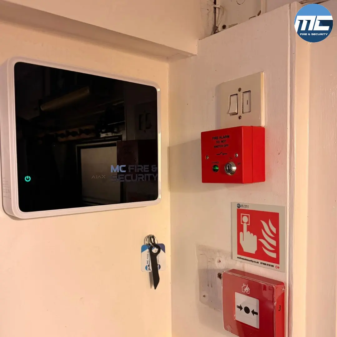 MC Fire & Security Ajax tablet with manual call point and framed zone plan