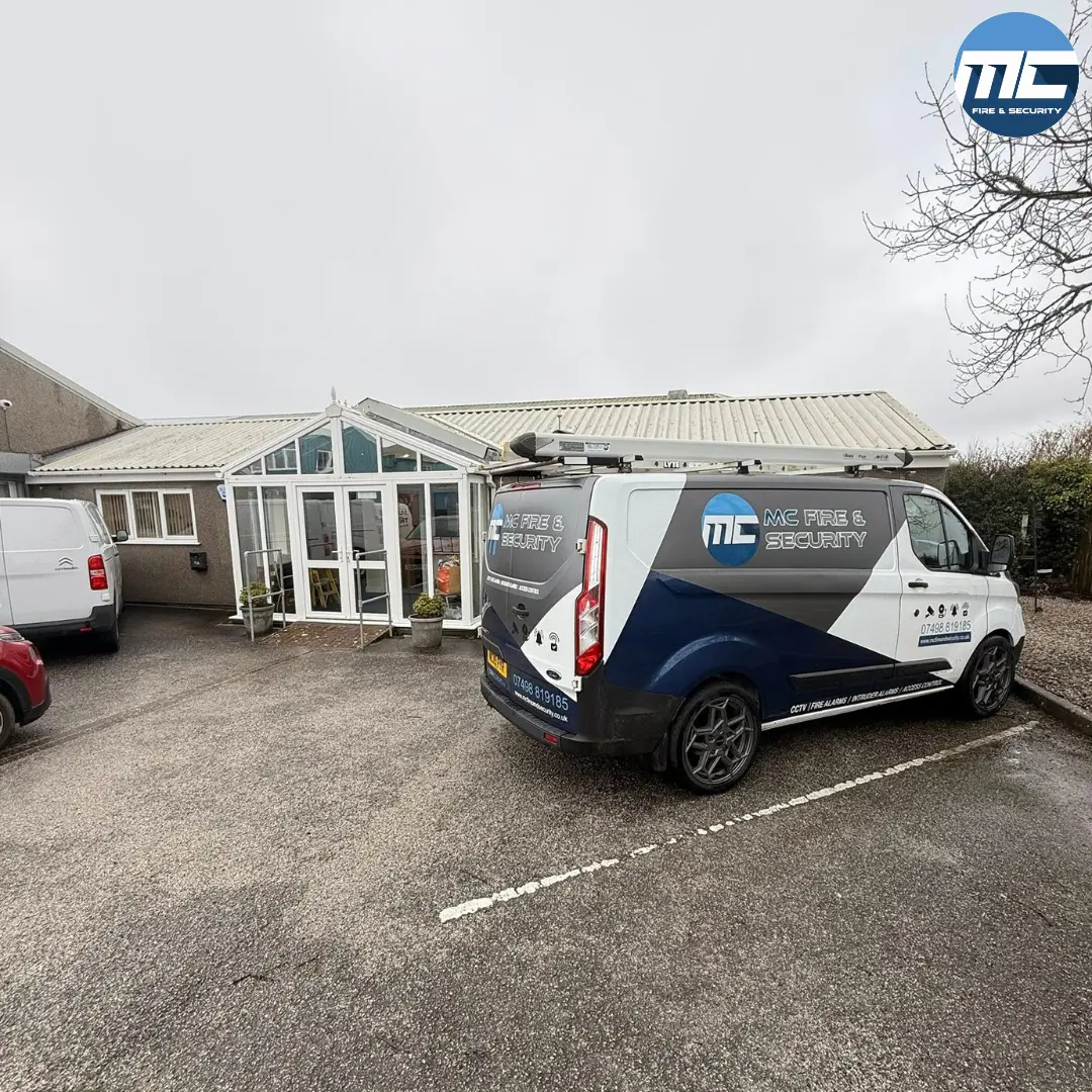MC Fire & Security van outside a residential bungalow in Cornwall