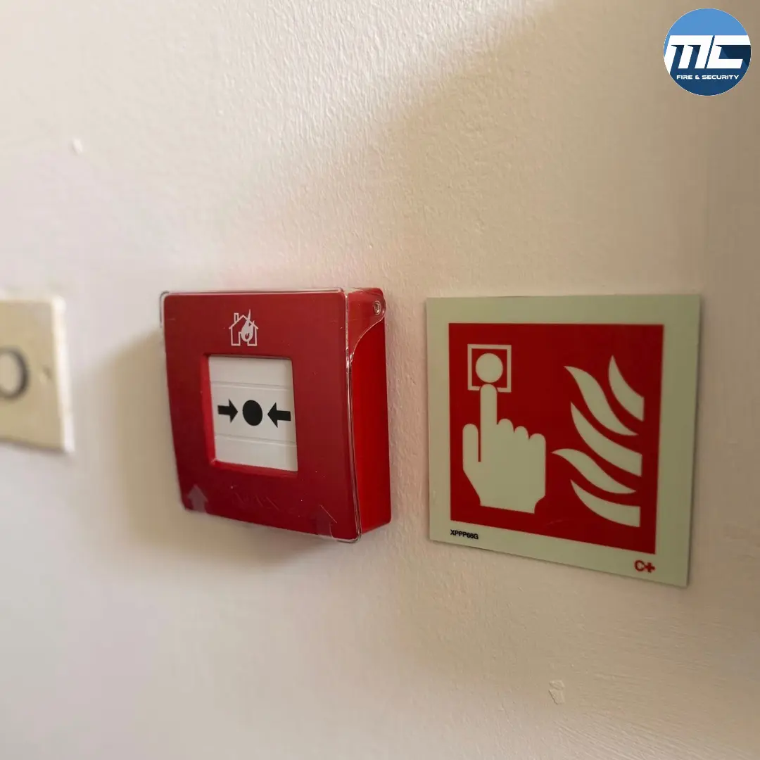 Fire alarm manual call point with BS5499 fire-alarm sign — MC Fire & Security install