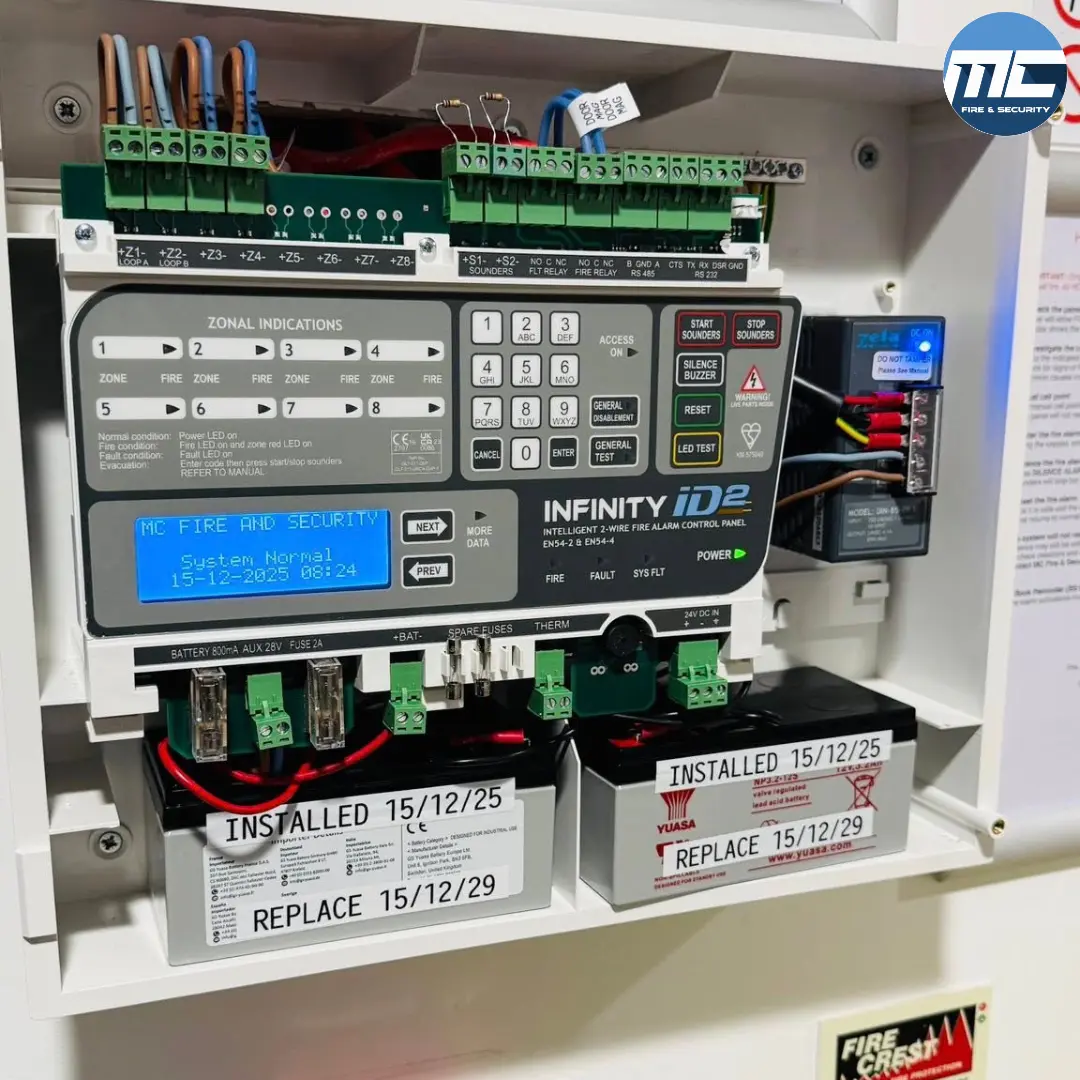 Inside a Firecrest Infinity ID2 fire alarm panel at a Cornwall children's nursery — MC Fire & Security