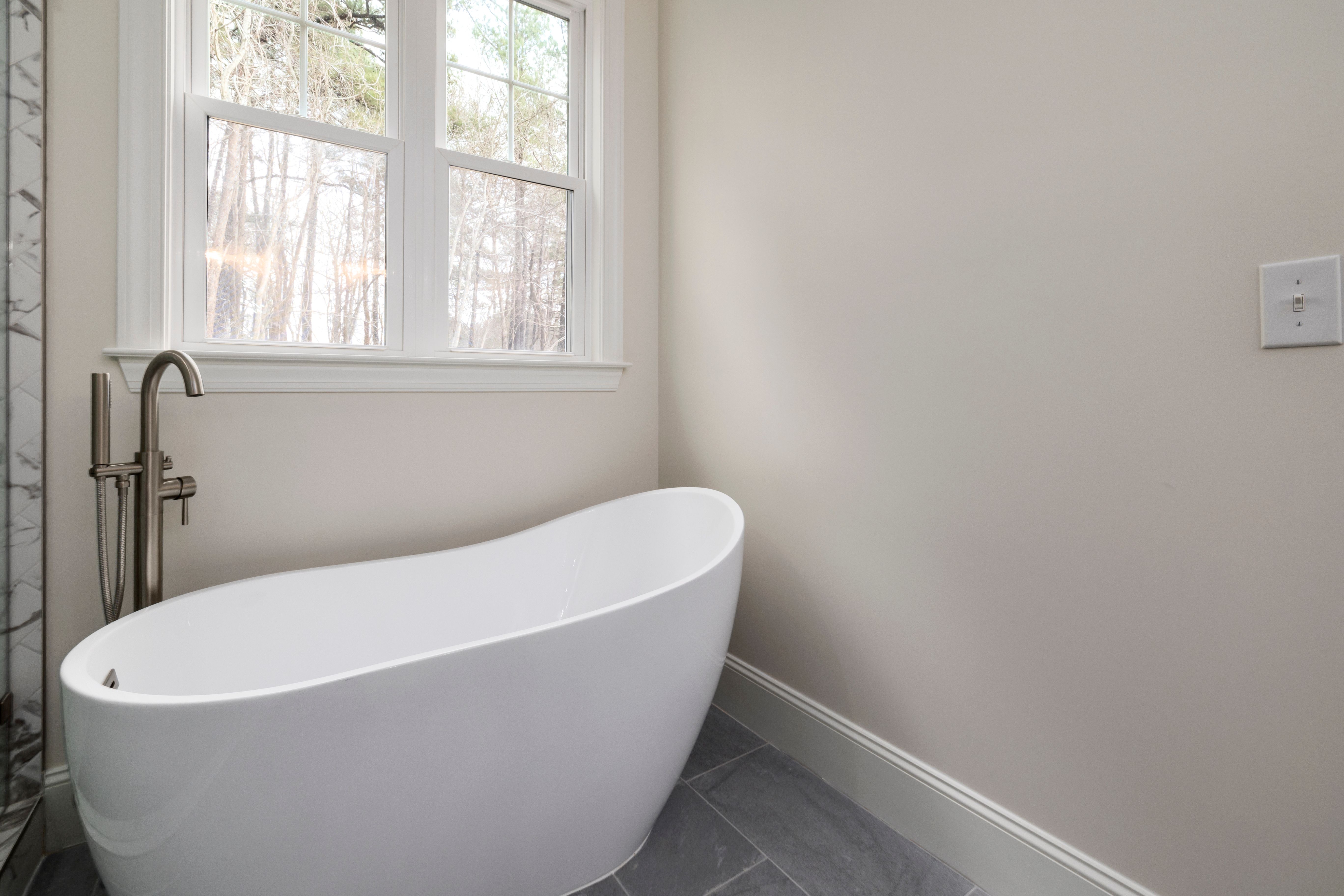 bathroom with tub bathroom with tub