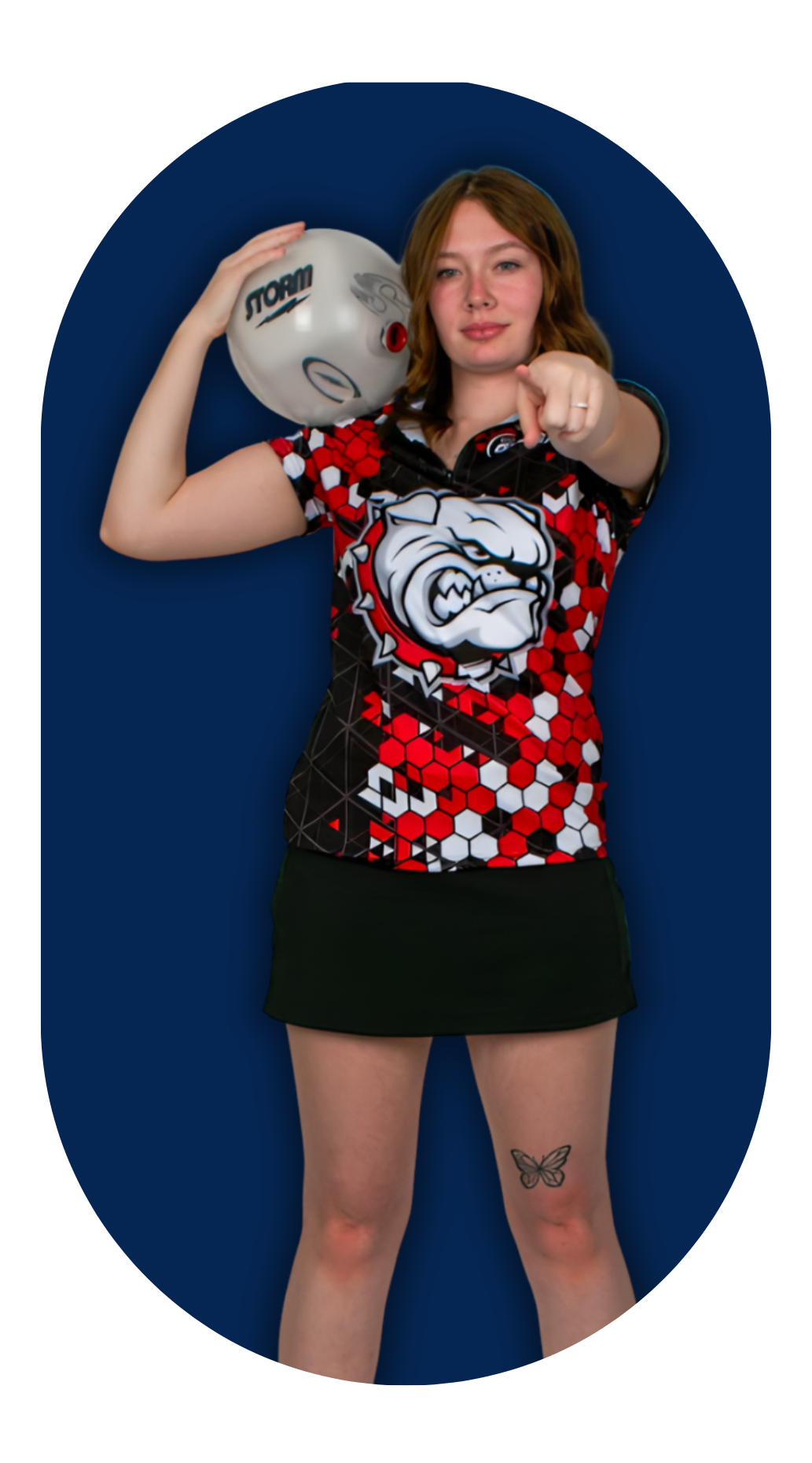 Athlete pointing with bowling ball