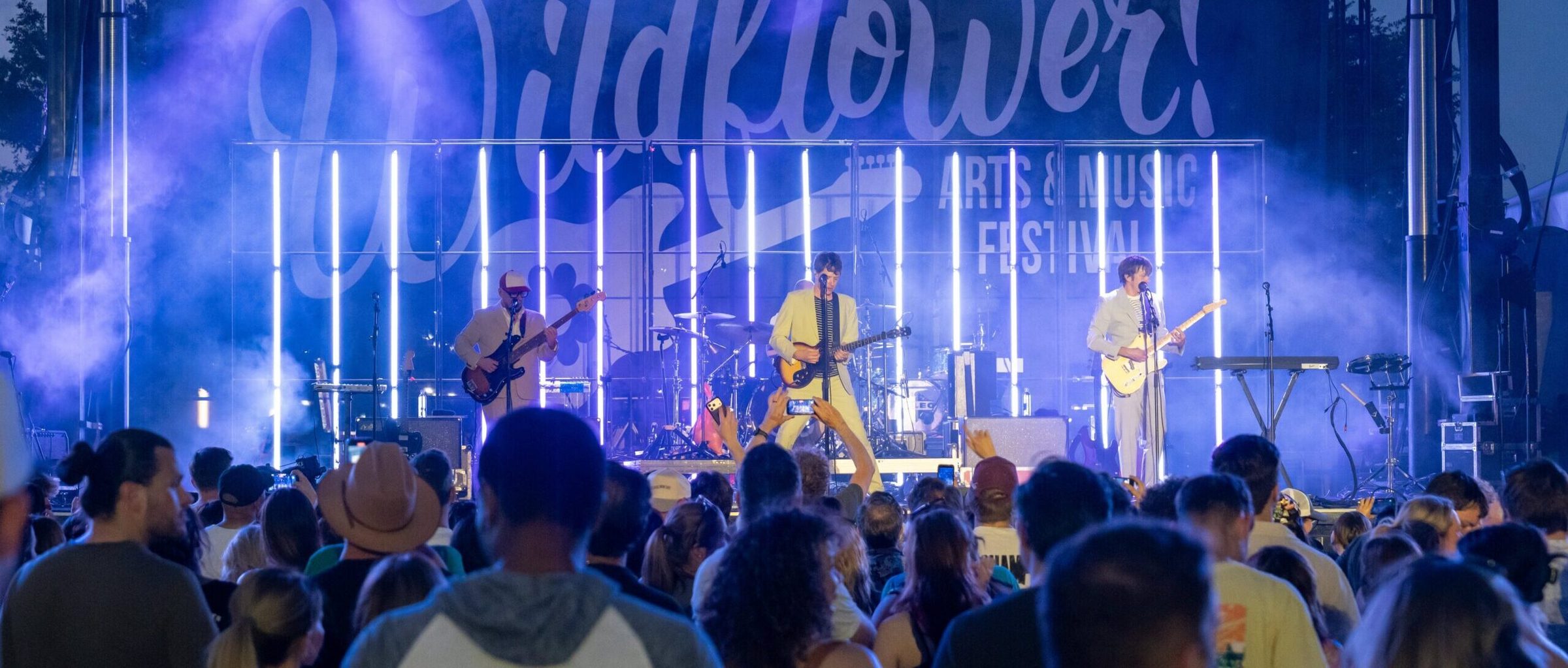 A band performing on the main stage at the Wildflower Arts and Music Festival