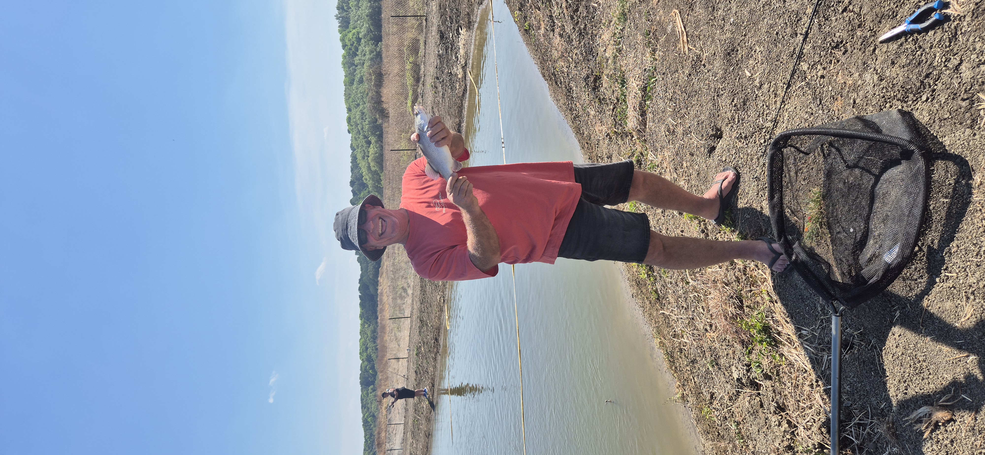 Man Holding barra - hooked on barra