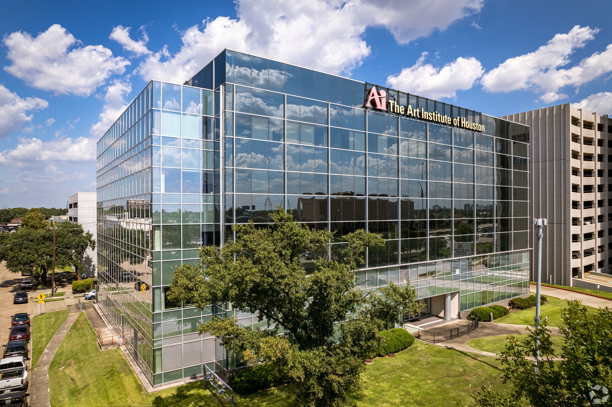 Art Institute of Houston exterior building with glass facade and signage