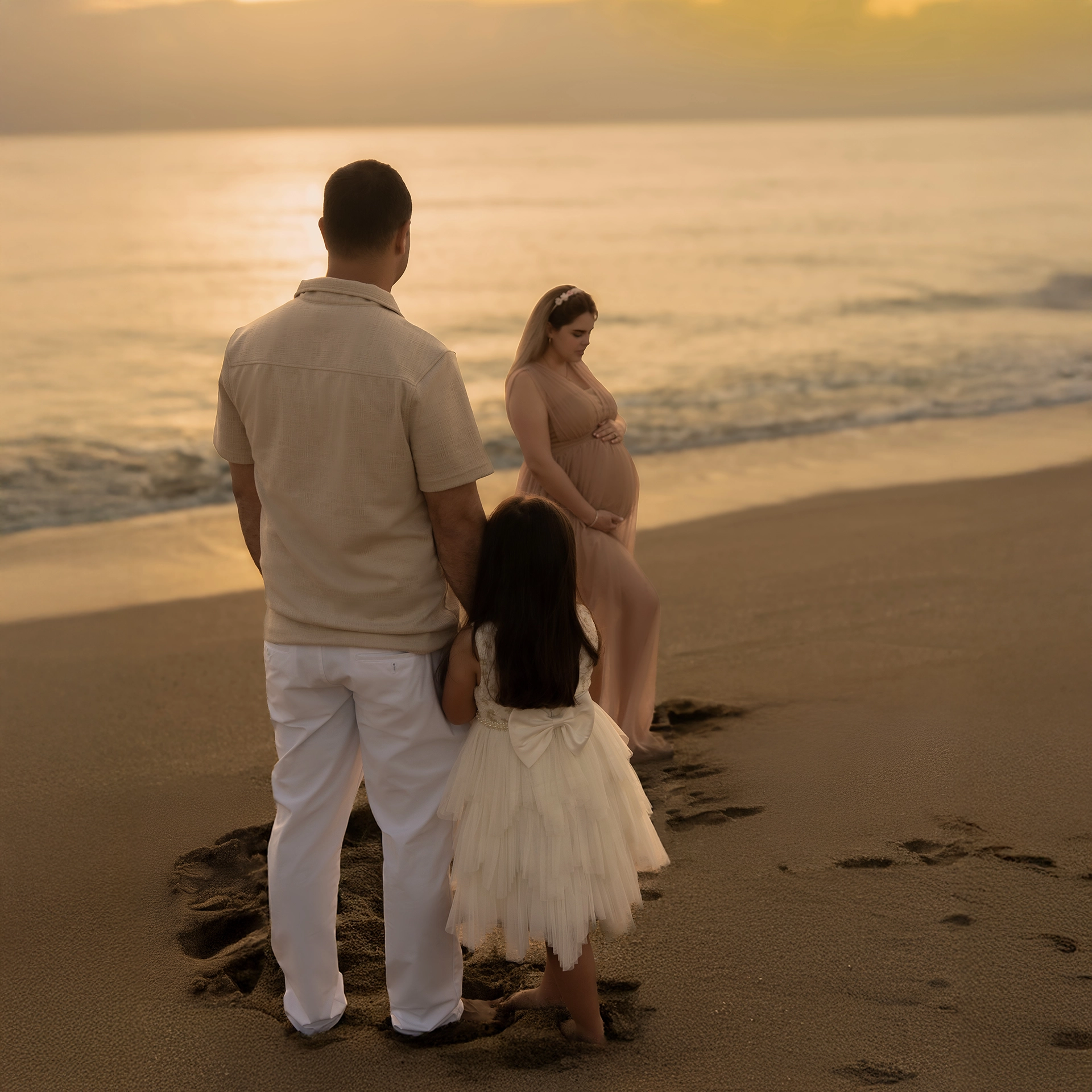 Family having memories together on Treasure Coast beach at sunrise Family having memories together on Treasure Coast beach at sunrise