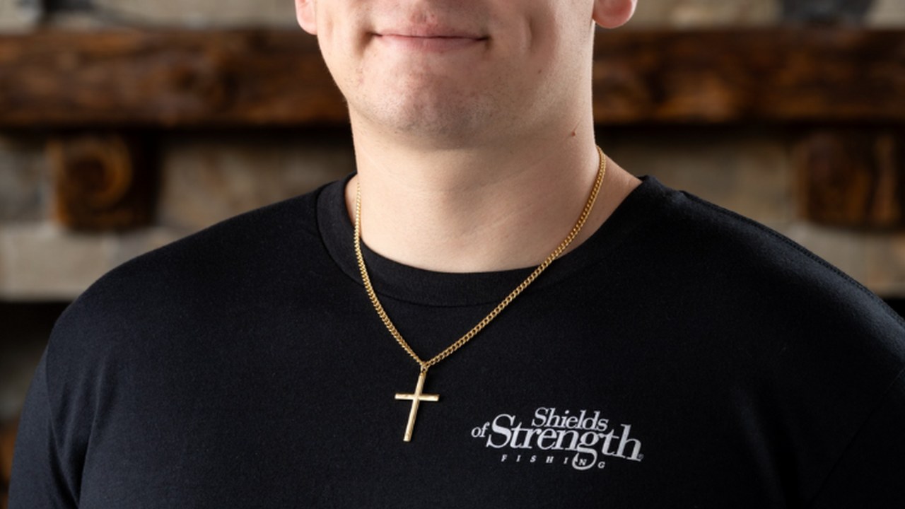 Shields of Strength cross necklace