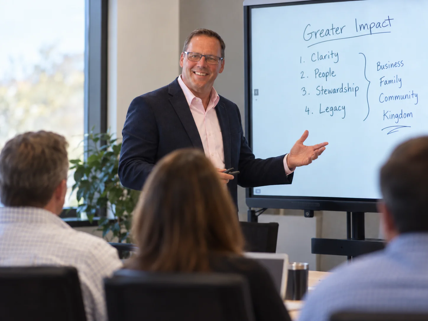 Jim Watson leading a business leadership workshop.
