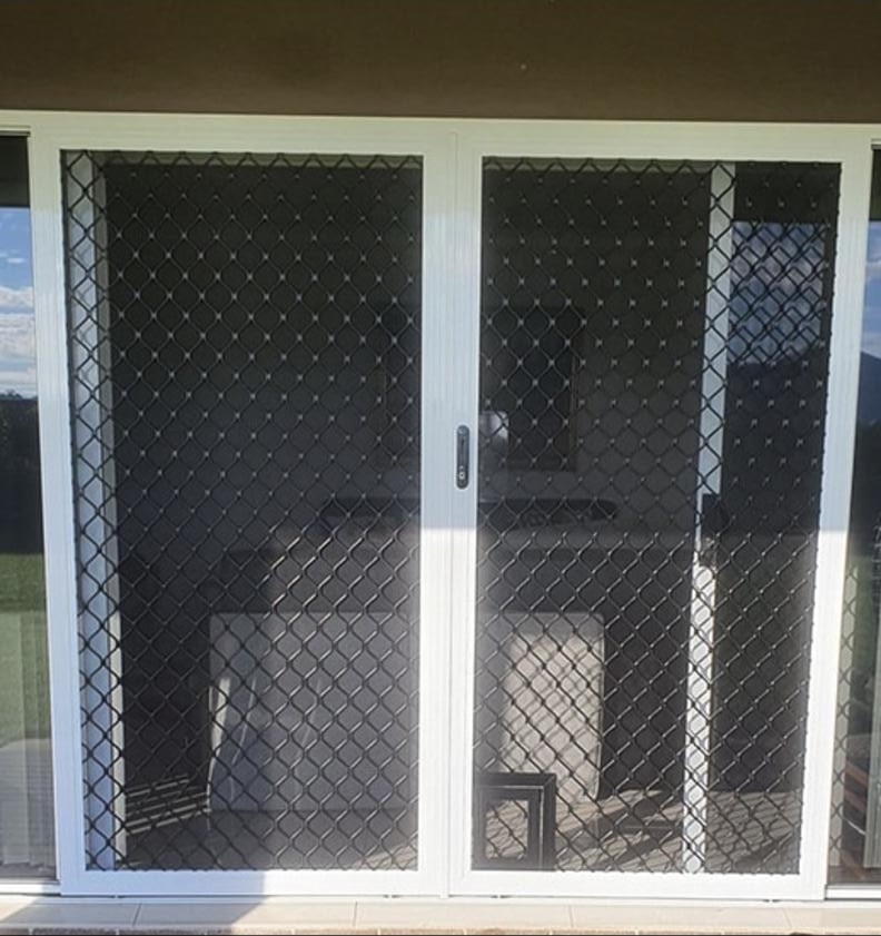 White Diamond Grille double barrier doors