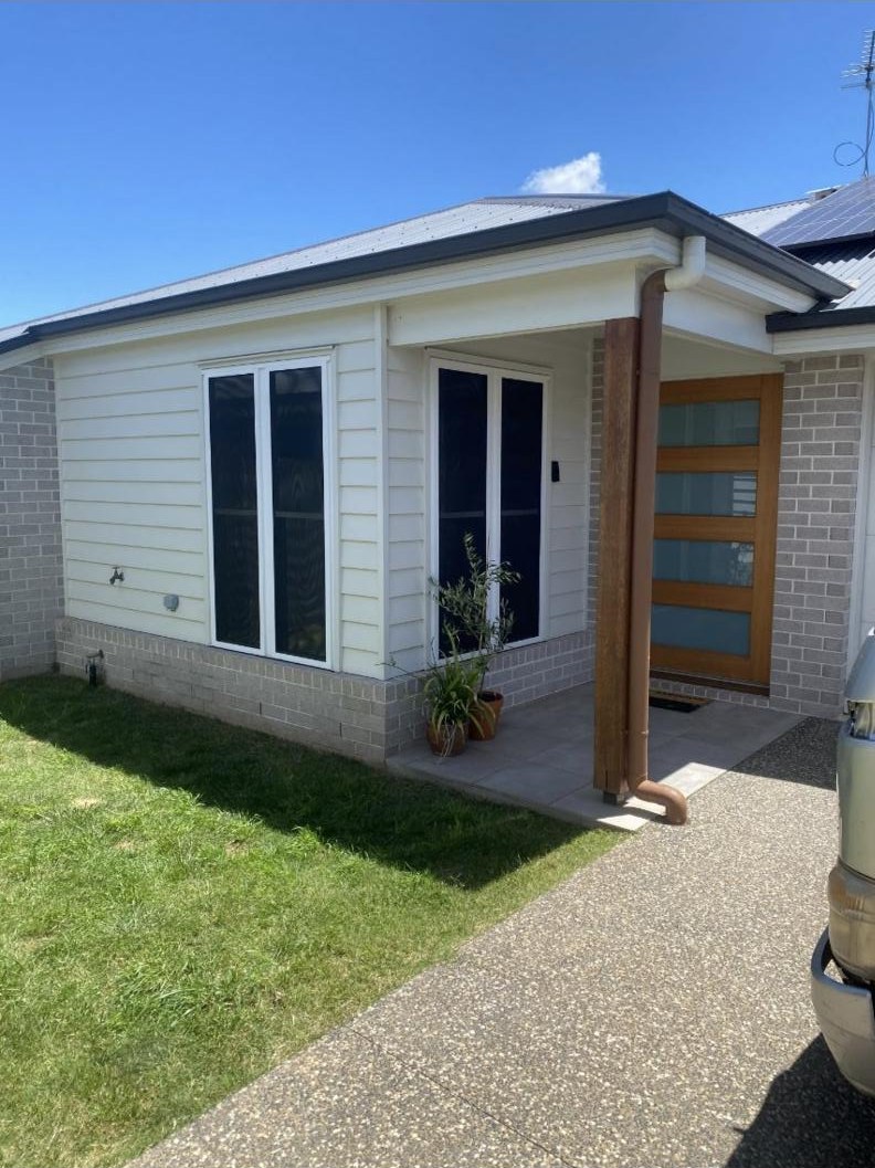SecureView security screens fitted over double-hung windows on a new Toowoomba home