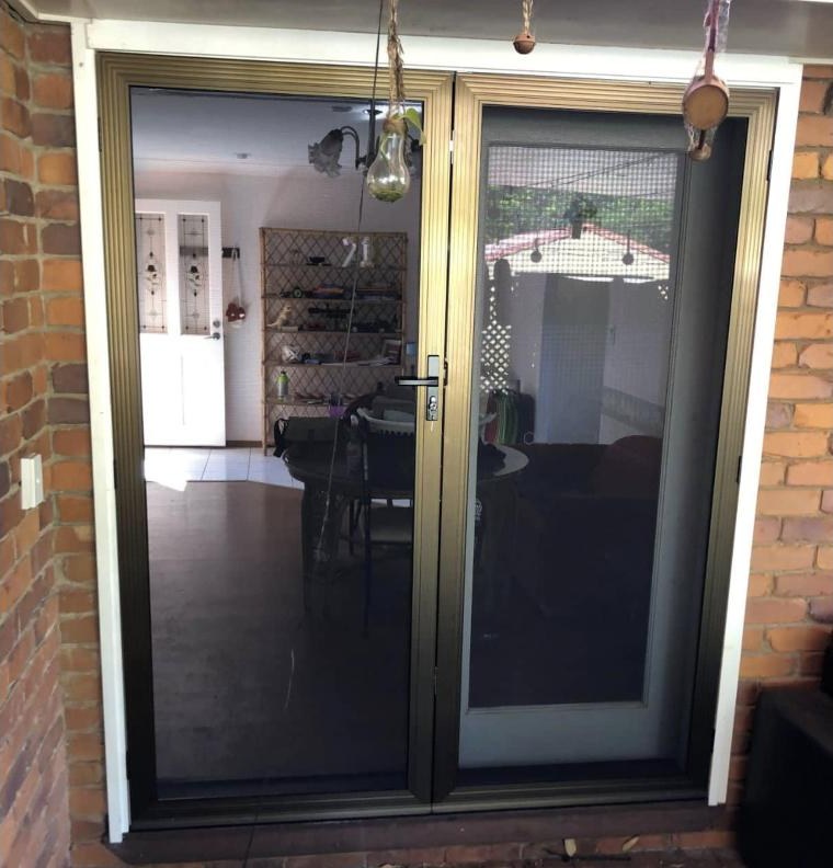 SecureView French security doors with bronze anodised frames on a brick Toowoomba home