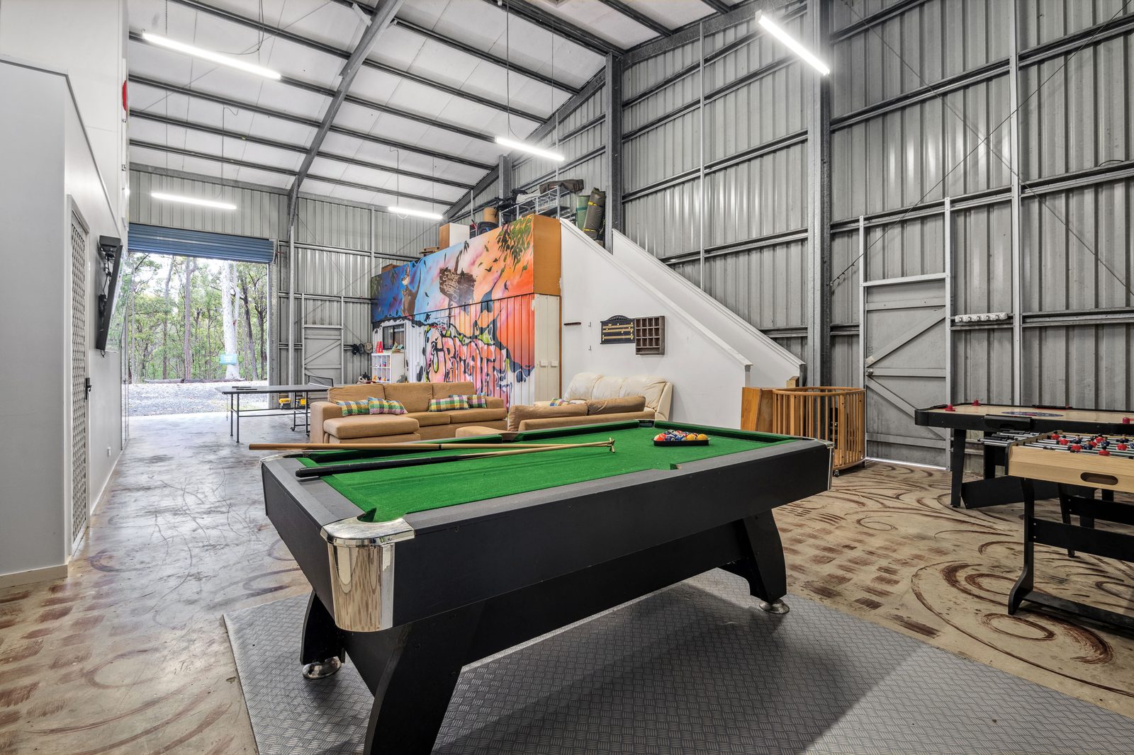 Games room with pool table, table tennis and foosball