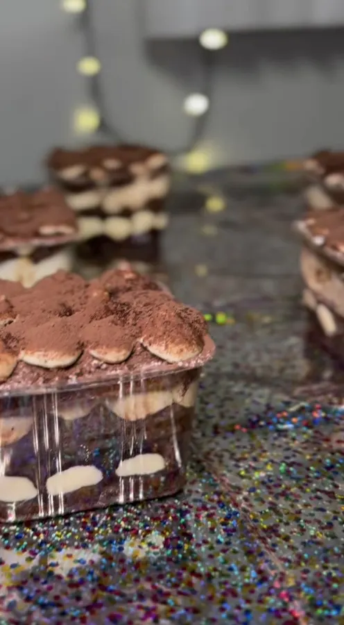 Close-up of cocoa-dusted mascarpone layers
