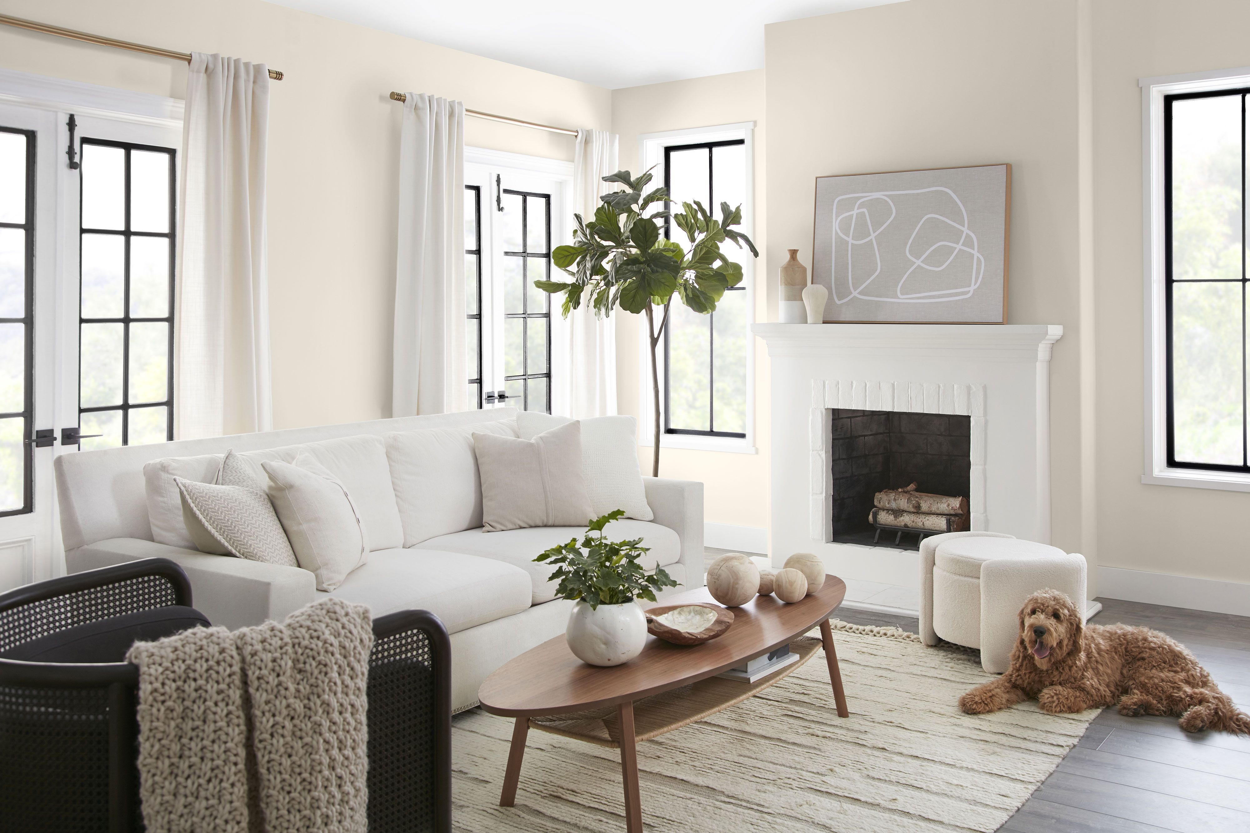 Professional living room painting services in Calgary by Crown Apex Corp