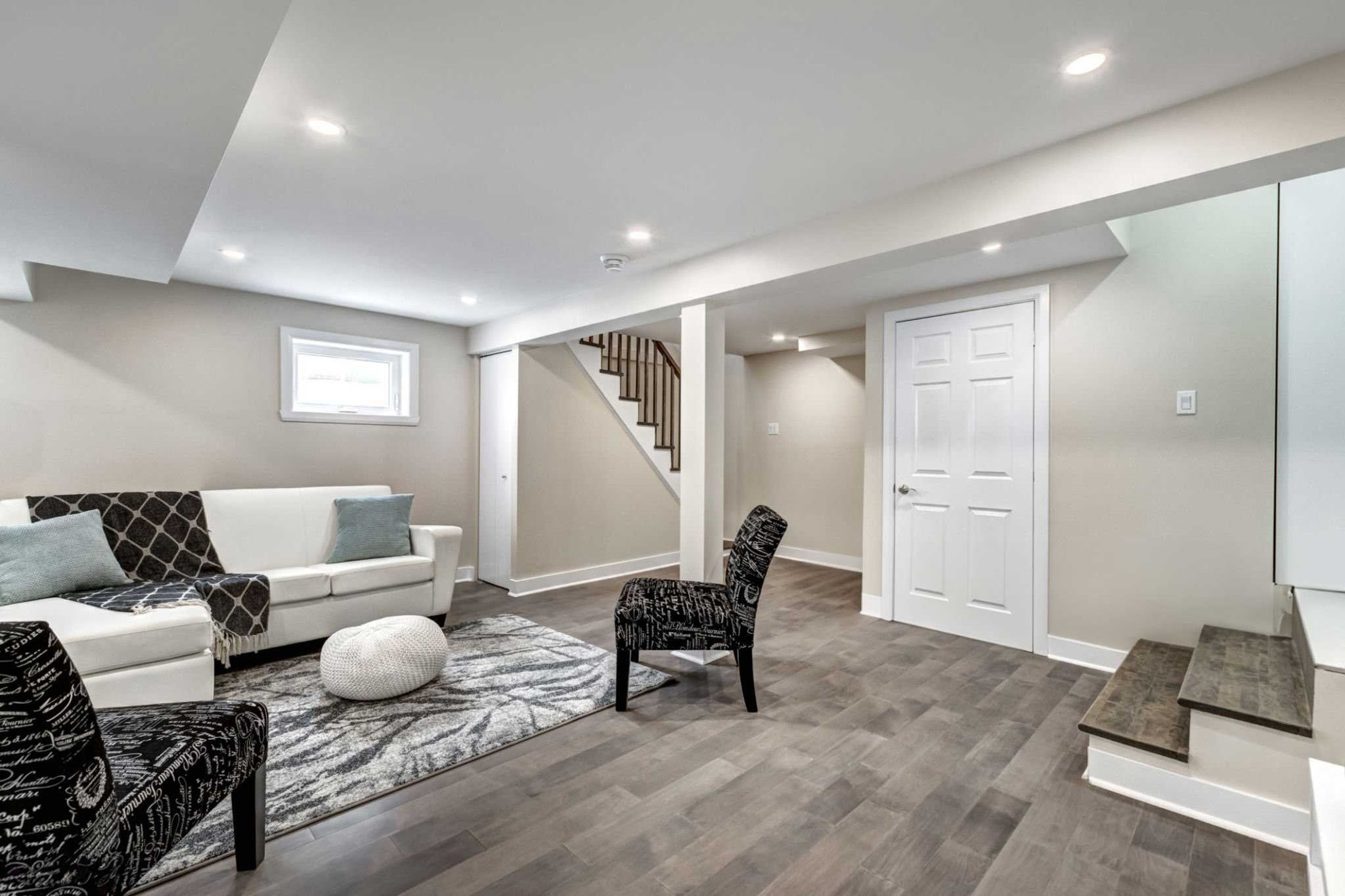 Professional basement painting services in Calgary by Crown Apex Corp