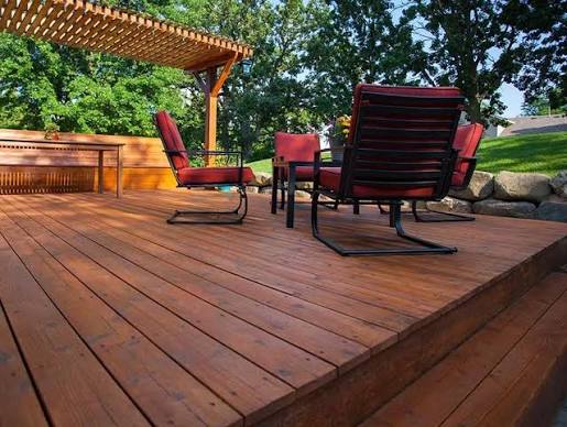 Professional deck staining services in Calgary by Crown Apex Corp