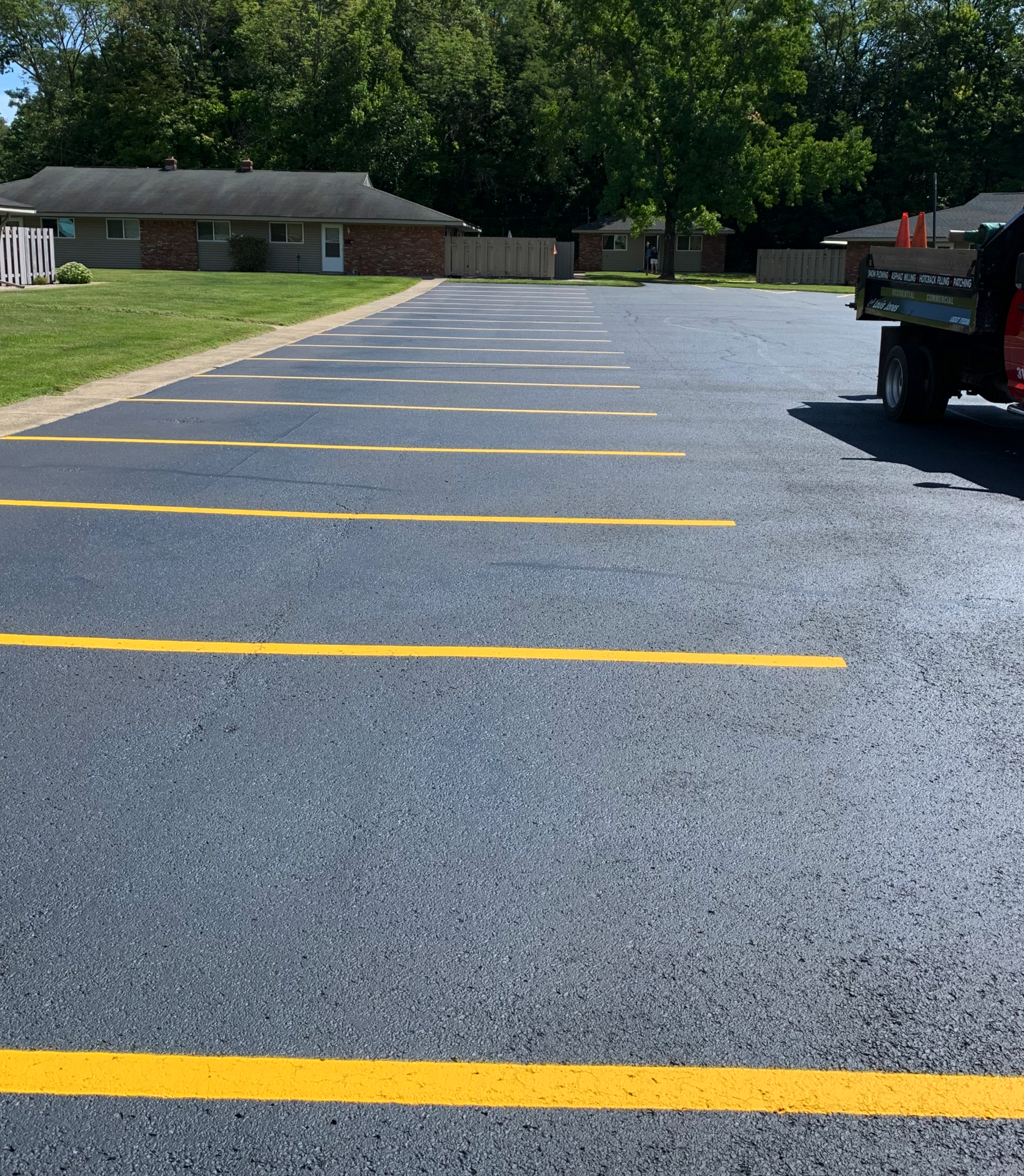 Freshly sealed black residential driveway in Noblesville