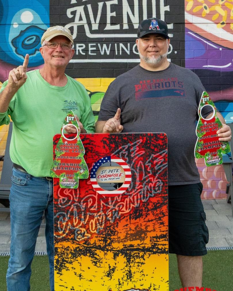 1st place winners at the Movember Cornhole Challenge