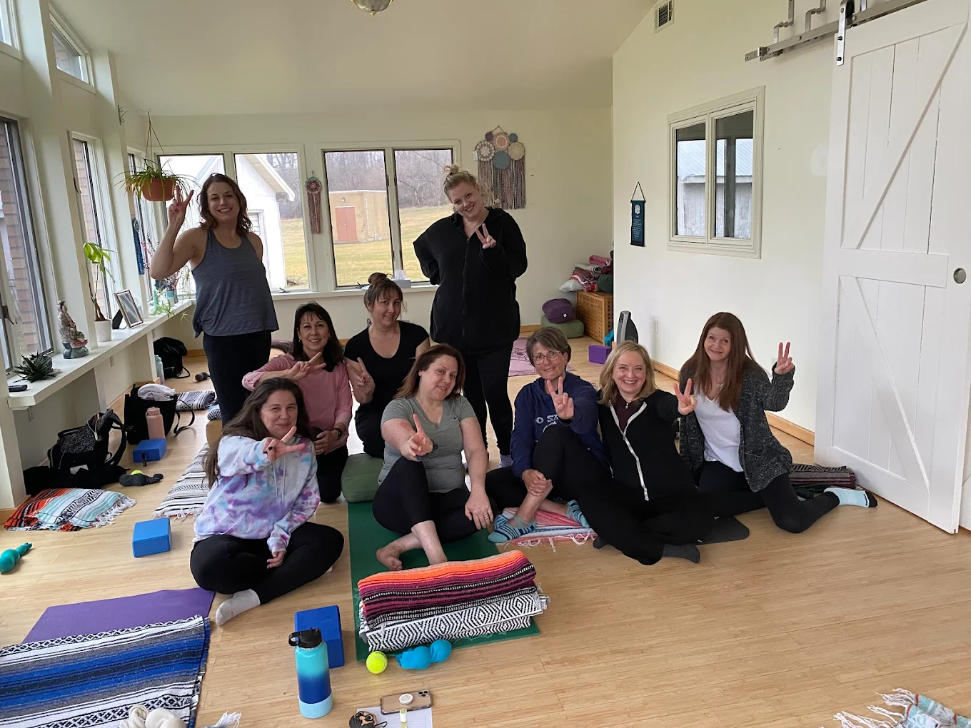 A group at a Holistic Awakenings workshop, gathered together in the meditation room