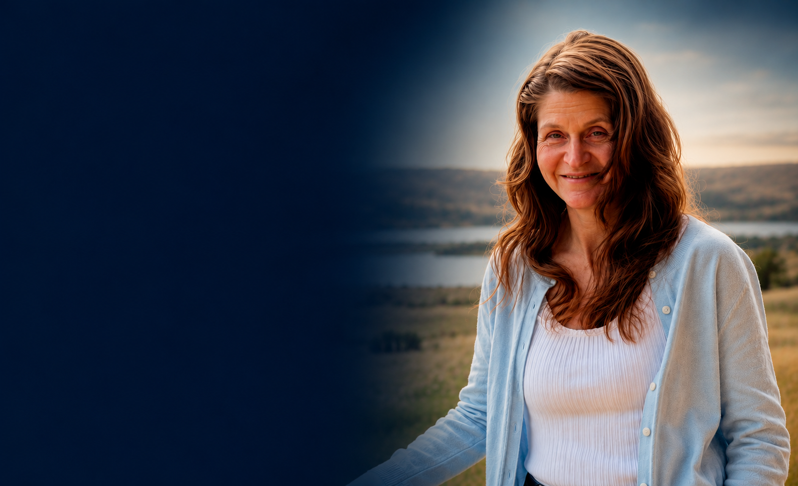 Stylized, digitally enhanced portrait of Jenna Galligani on a golden hillside above a lake, hair loose over a light blue cardigan, the scene dissolving into deep navy on the left.
