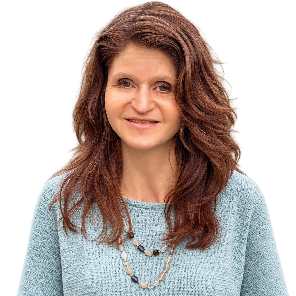 Jenna Galligani smiling in a light blue sweater.