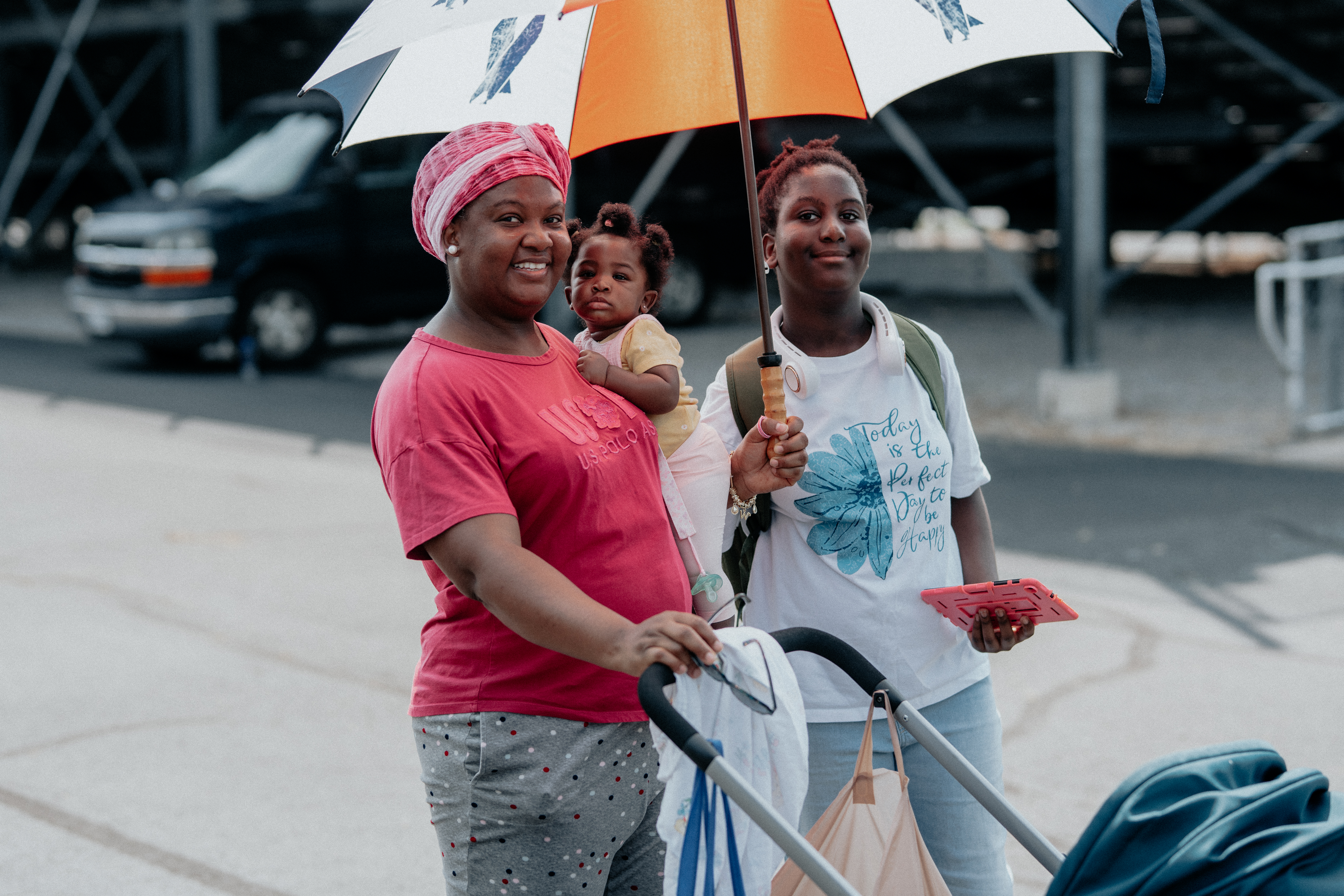 Volunteer distributing food to child