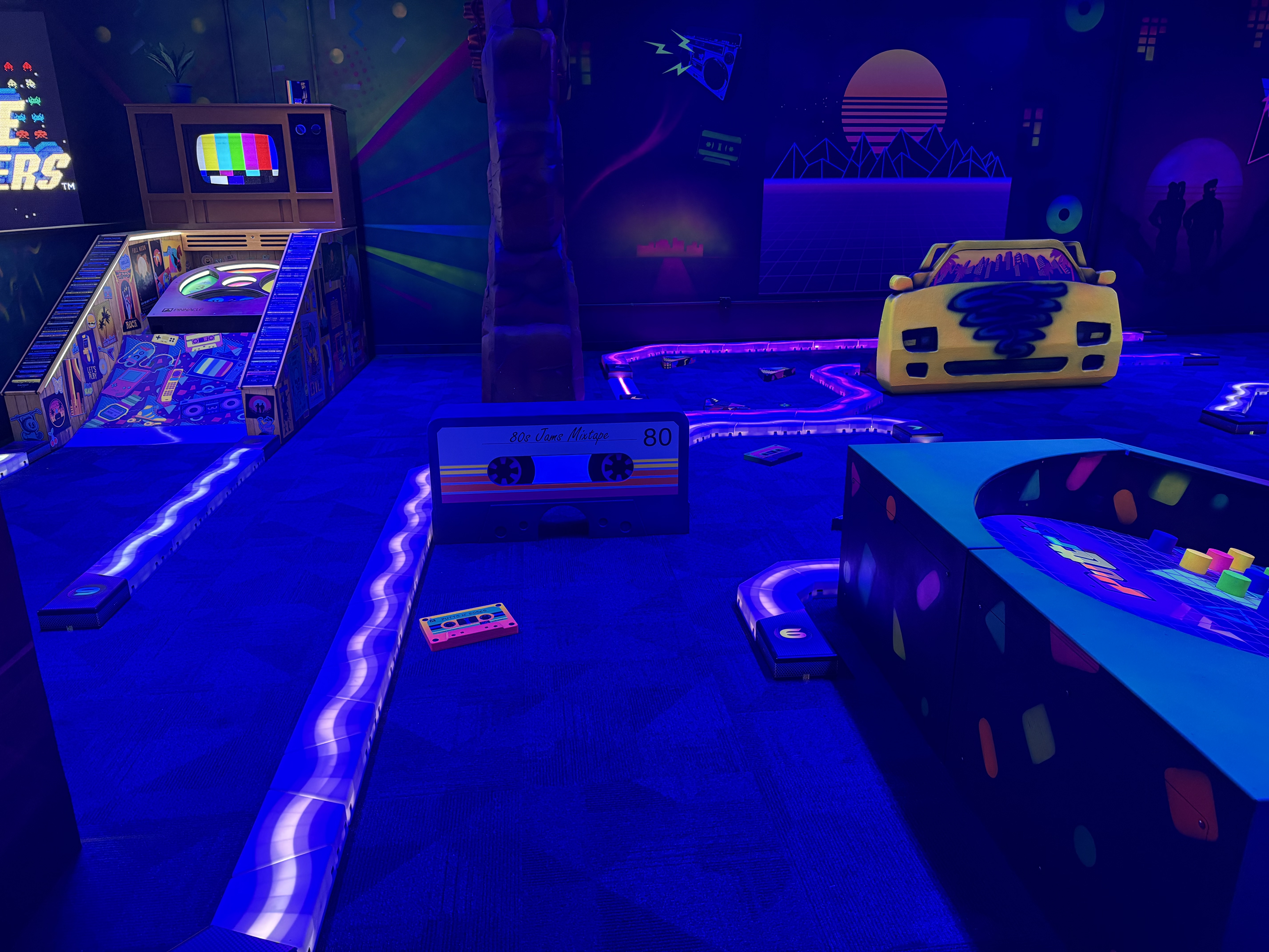Putting on the mini golf course