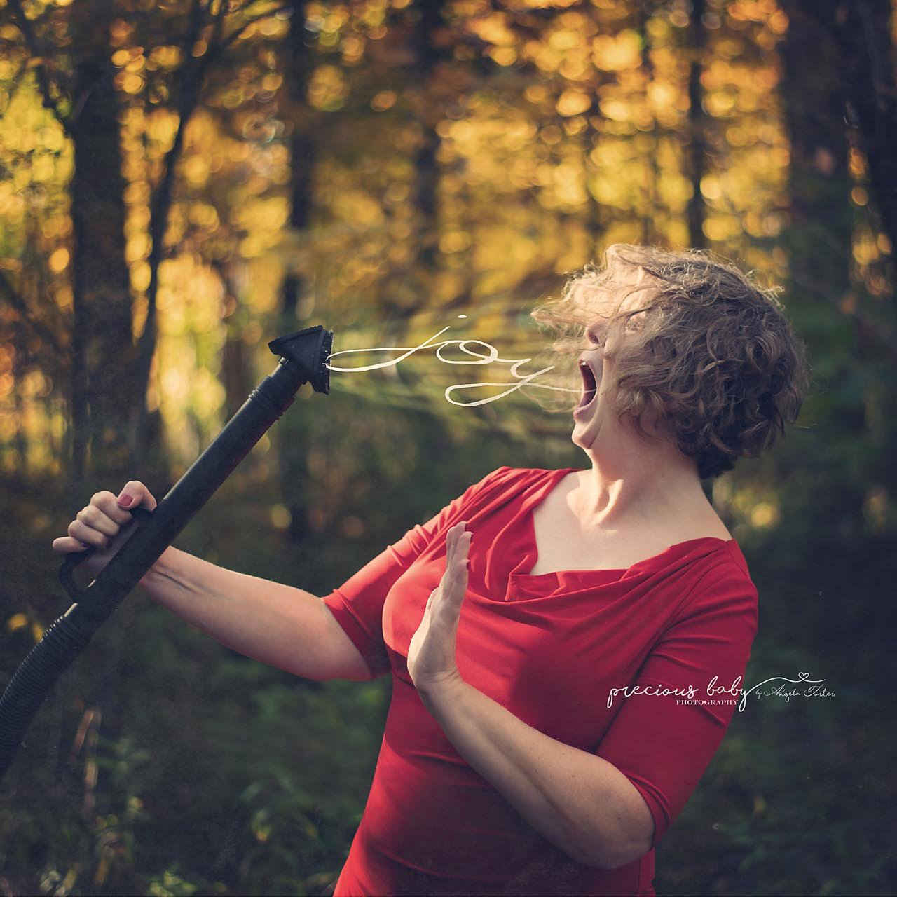 An artistic photo by Angela Forker depicting a vacuum sucking the joy out of me