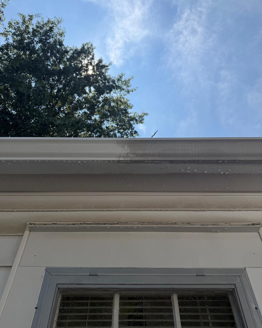 White gutter and fascia after brightening, the face clean and free of oxidation streaks