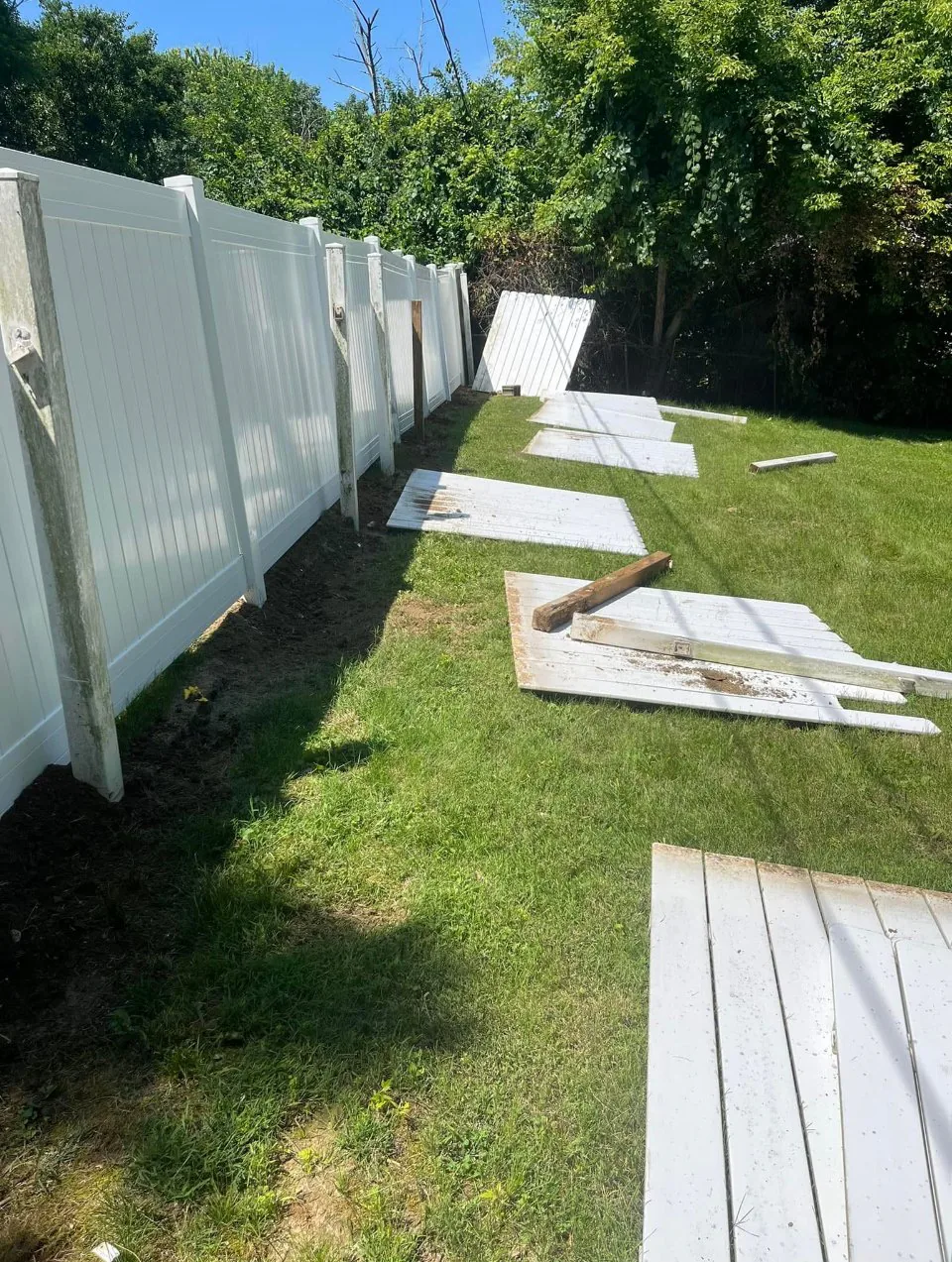 Vinyl privacy fence going in