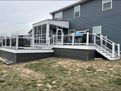 Screened porch and deck with white railings