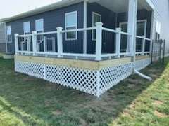 Screened porch with lattice skirting