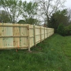 Long run of wood privacy fence
