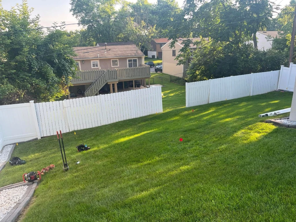 Vinyl fence line and finished lawn