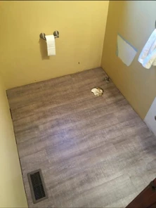 New plank flooring in a bathroom