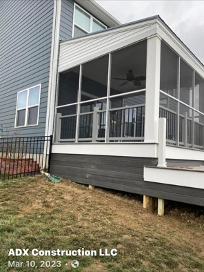 Screened porch and deck from the yard