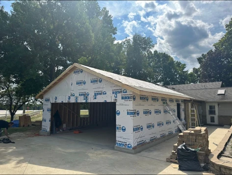 Garage addition sheathed and wrapped