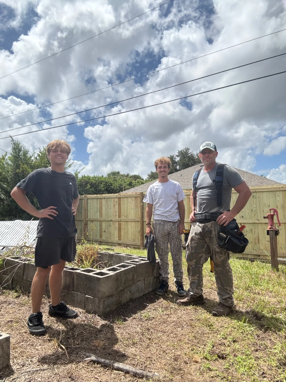 The ADX crew on a wood privacy fence job