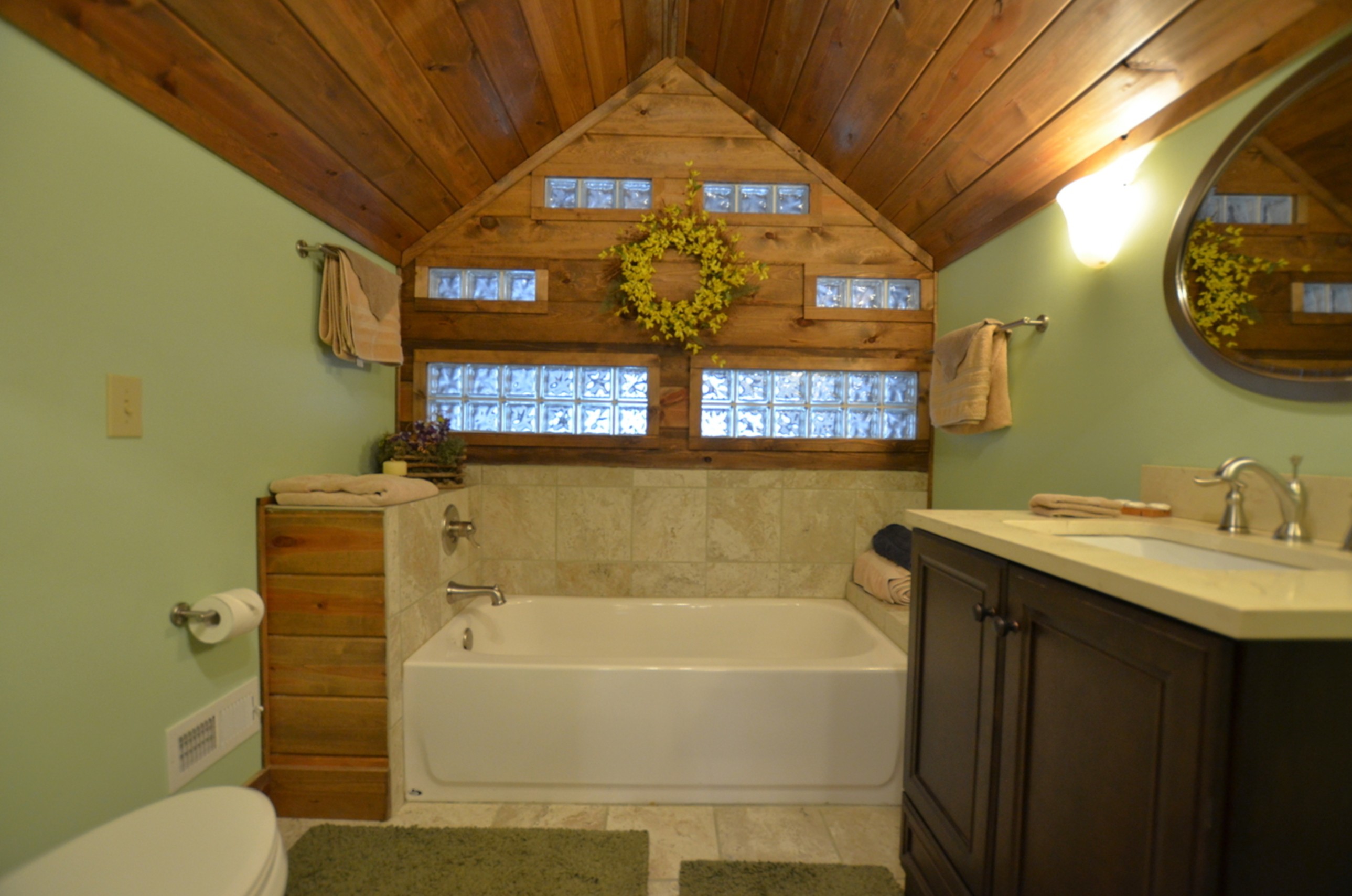 Private bathroom with heated tile flooring at Tulip Poplar cabin