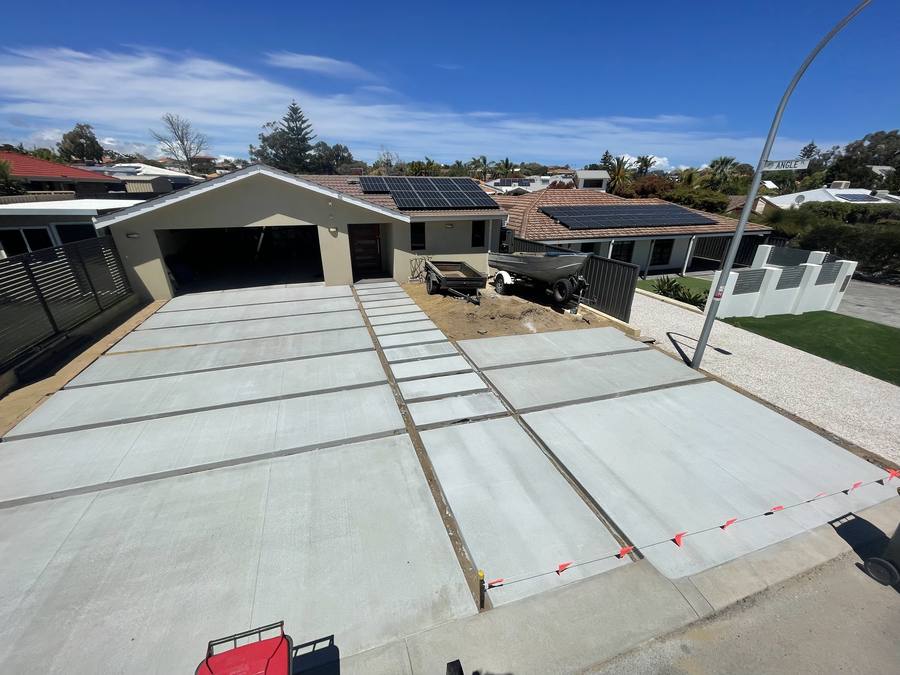 Garage slab and driveway with clean saw cuts