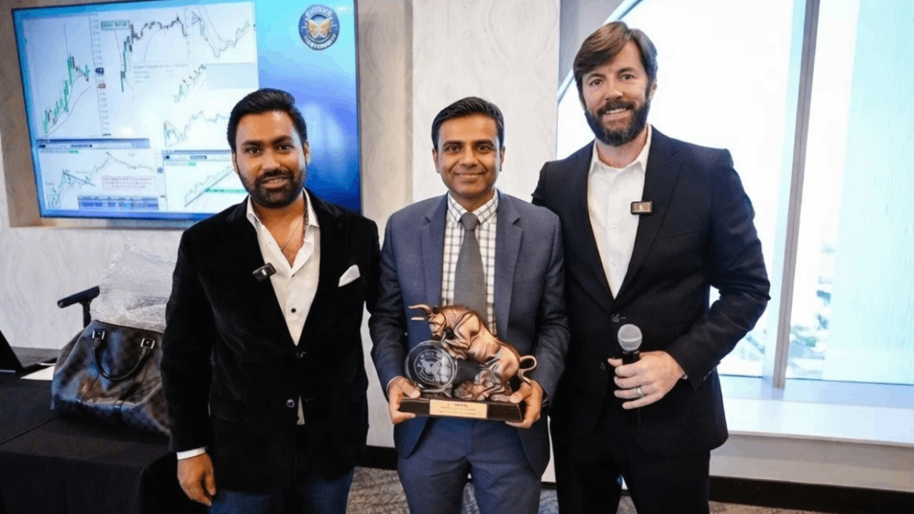 Jyoten Patel receiving $200k award at Evolve Summit