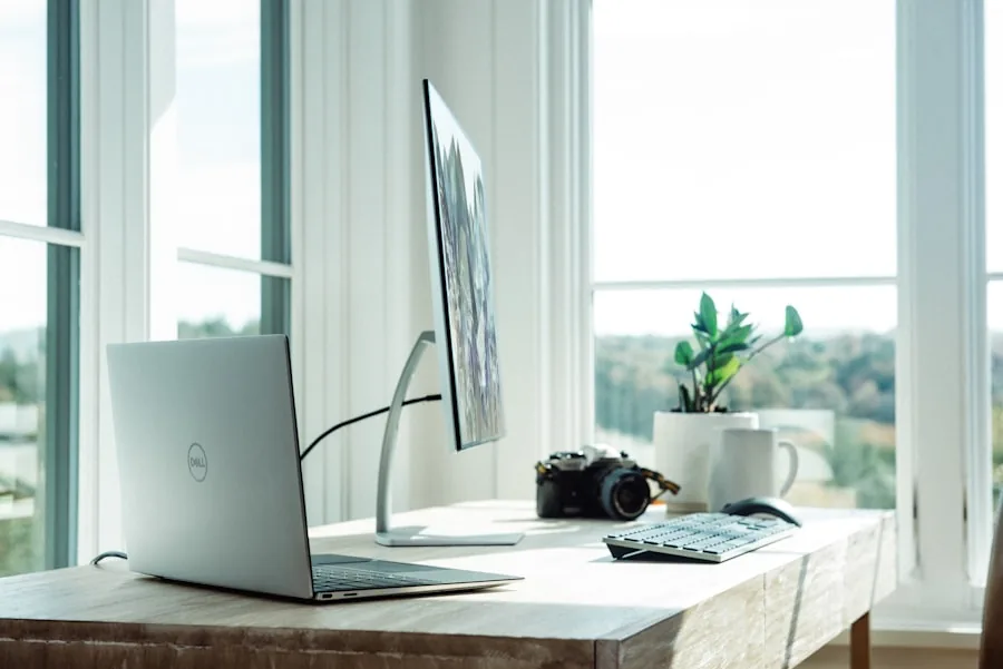 Person on a laptop at a home office desk sending messages.
